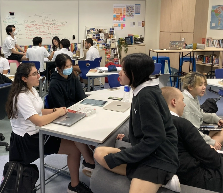 High school students collaborating in classroom